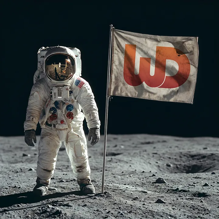 Astronaut standing on the moon's surface next to a planted flag featuring a large orange WD logo.